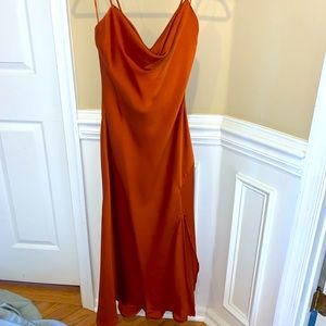 Satin burnt orange cowl neck dress with leg slit